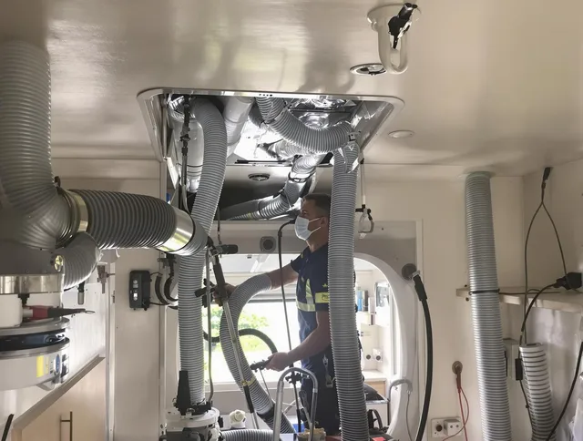 Pembroke Air Duct Cleaning specialist performing precise mobile home duct cleaning in Pembroke