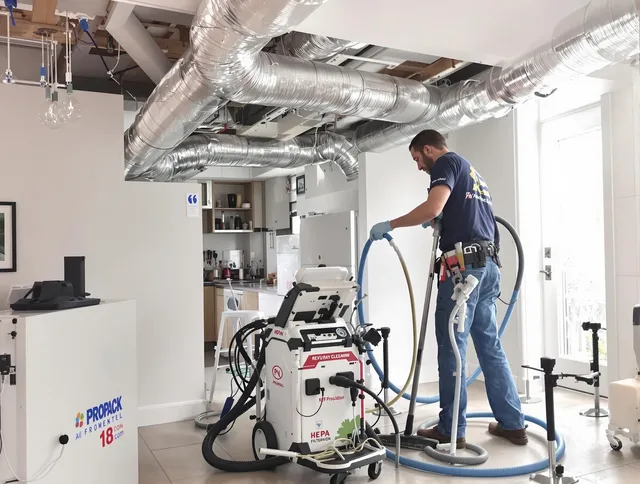 Pembroke Air Duct Cleaning technician performing advanced pure duct cleaning with specialized equipment in Pembroke